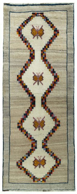 Full view of 2000s Persian Gabbeh rug from Iran / Persia, 209 × 82 cm in Beige tones