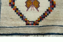 Central medallion detail of 2000s Persian Gabbeh rug from Iran / Persia