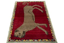Surface texture of 2000s Persian Gabbeh rug with natural Wool and intricate pattern