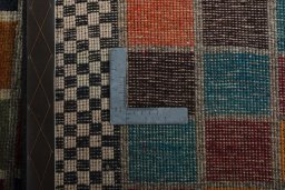 Close-up detail of 2000s Persian Gabbeh rug from Iran / Persia showing Wool weave