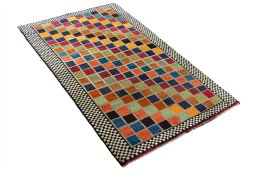 Close-up detail of 2000s Persian Gabbeh rug from Iran / Persia showing Wool weave