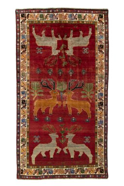 Full view of 2000s Persian Gabbeh rug from Iran / Persia, 283 × 153 cm in Red tones