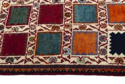 Close-up detail of 2000s Persian Gabbeh rug from Iran / Persia showing Wool weave