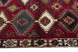 Close-up detail of 2000s Persian Gabbeh rug from Iran / Persia showing Wool weave