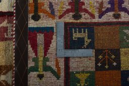 Close-up detail of 2000s Persian Gabbeh rug from Iran / Persia showing Wool weave