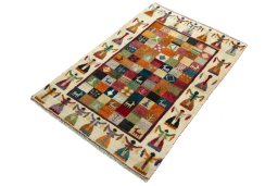 Corner detail of 2000s Persian Gabbeh rug showing border pattern and Wool pile
