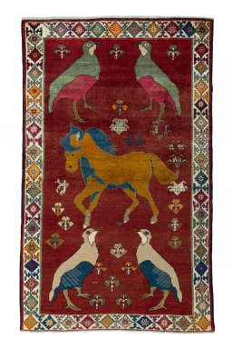 Full view of 2000s Persian Gabbeh rug from Iran / Persia, 227 × 140 cm in Red tones