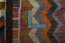 Close-up detail of 2000s Persian Gabbeh rug from Iran / Persia showing Wool weave