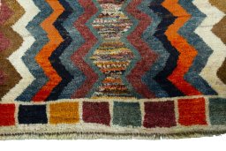 Central medallion detail of 2000s Persian Gabbeh rug from Iran / Persia