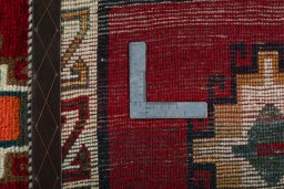 Close-up detail of 2000s Persian Gabbeh rug from Iran / Persia showing Wool weave