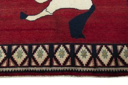 Central medallion detail of 2000s Persian Gabbeh rug from Iran / Persia