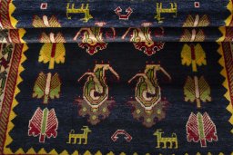 Full view of 2000s Persian Gabbeh rug from Iran / Persia, 186 × 123 cm in Blue tones