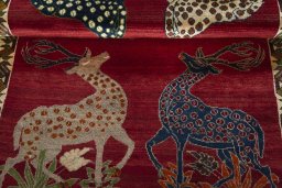 Full view of 2000s Persian Gabbeh rug from Iran / Persia, 190 × 116 cm in Red tones