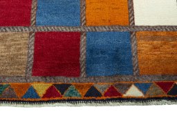 Central medallion detail of 2000s Persian Gabbeh rug from Iran / Persia