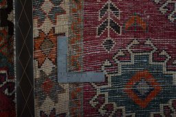 Close-up detail of 2000s Persian Gabbeh rug from Iran / Persia showing Wool weave