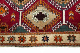 Central medallion detail of 2000s Persian Gabbeh rug from Iran / Persia