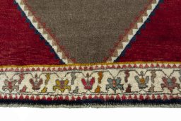 Central medallion detail of 2000s Persian Gabbeh rug from Iran / Persia