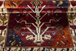 Full view of 2000s Persian Gabbeh rug from Iran / Persia, 192 × 121 cm in Red tones