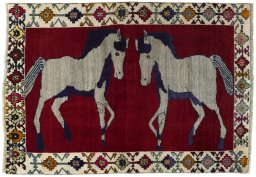 Full view of 2000s Persian Gabbeh rug from Iran / Persia, 150 × 105 cm in Red tones