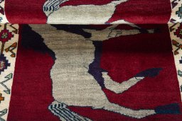 Full view of 2000s Persian Gabbeh rug from Iran / Persia, 150 × 105 cm in Red tones