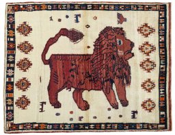 Full view of 2000s Persian Gabbeh rug from Iran / Persia, 186 × 146 cm in Beige tones