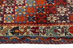 Close-up detail of 1970s Persian Gabbeh rug from Iran / Persia showing Wool weave