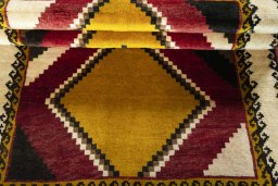 Full view of 2000s Persian Gabbeh rug from Iran / Persia, 195 × 127 cm in Red tones