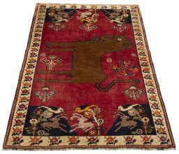 Surface texture of 2000s Persian Gabbeh rug with natural Wool and intricate pattern