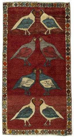 Full view of 2000s Persian Gabbeh rug from Iran / Persia, 186 × 98 cm in Red tones