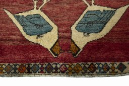 Central medallion detail of 2000s Persian Gabbeh rug from Iran / Persia