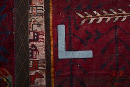 Close-up detail of 2000s Persian Gabbeh rug from Iran / Persia showing Wool weave