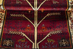 Full view of 2000s Persian Gabbeh rug from Iran / Persia, 164 × 108 cm in Red tones