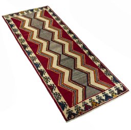 Close-up detail of 2000s Persian Gabbeh rug from Iran / Persia showing Wool weave