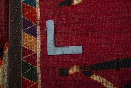 Close-up detail of 2000s Persian Gabbeh rug from Iran / Persia showing Wool weave