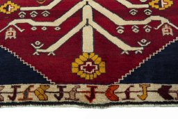 Central medallion detail of 2000s Persian Gabbeh rug from Iran / Persia
