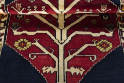 Full view of 2000s Persian Gabbeh rug from Iran / Persia, 153 × 118 cm in Red tones