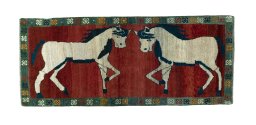 Full view of 2000s Persian Gabbeh rug from Iran / Persia, 208 × 88 cm in Red tones