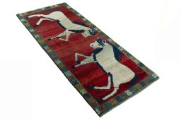 Close-up detail of 2000s Persian Gabbeh rug from Iran / Persia showing Wool weave
