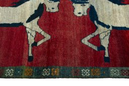 Close-up detail of 2000s Persian Gabbeh rug from Iran / Persia showing Wool weave