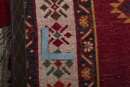 Close-up detail of 2000s Persian Gabbeh rug from Iran / Persia showing Wool weave