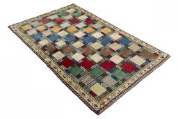 Close-up detail of 2000s Persian Gabbeh rug from Iran / Persia showing Wool weave