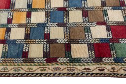 Close-up detail of 2000s Persian Gabbeh rug from Iran / Persia showing Wool weave