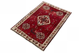 Corner detail of 2000s Persian Gabbeh rug showing border pattern and Wool pile