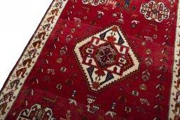 Backside of handmade 2000s Persian Gabbeh rug showing knot structure and weave density