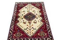 Surface texture of 2000s Persian Gabbeh rug with natural Wool and intricate pattern