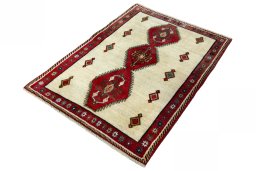 Corner detail of 2000s Persian Gabbeh rug showing border pattern and Wool pile