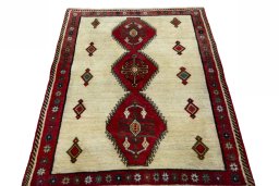 Surface texture of 2000s Persian Gabbeh rug with natural Wool and intricate pattern