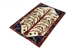 Corner detail of 2000s Persian Gabbeh rug showing border pattern and Wool pile