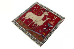 Corner detail of 2000s Persian Gabbeh rug showing border pattern and Wool pile