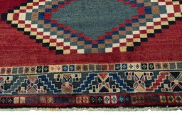 Central medallion detail of 2000s Persian Gabbeh rug from Iran / Persia